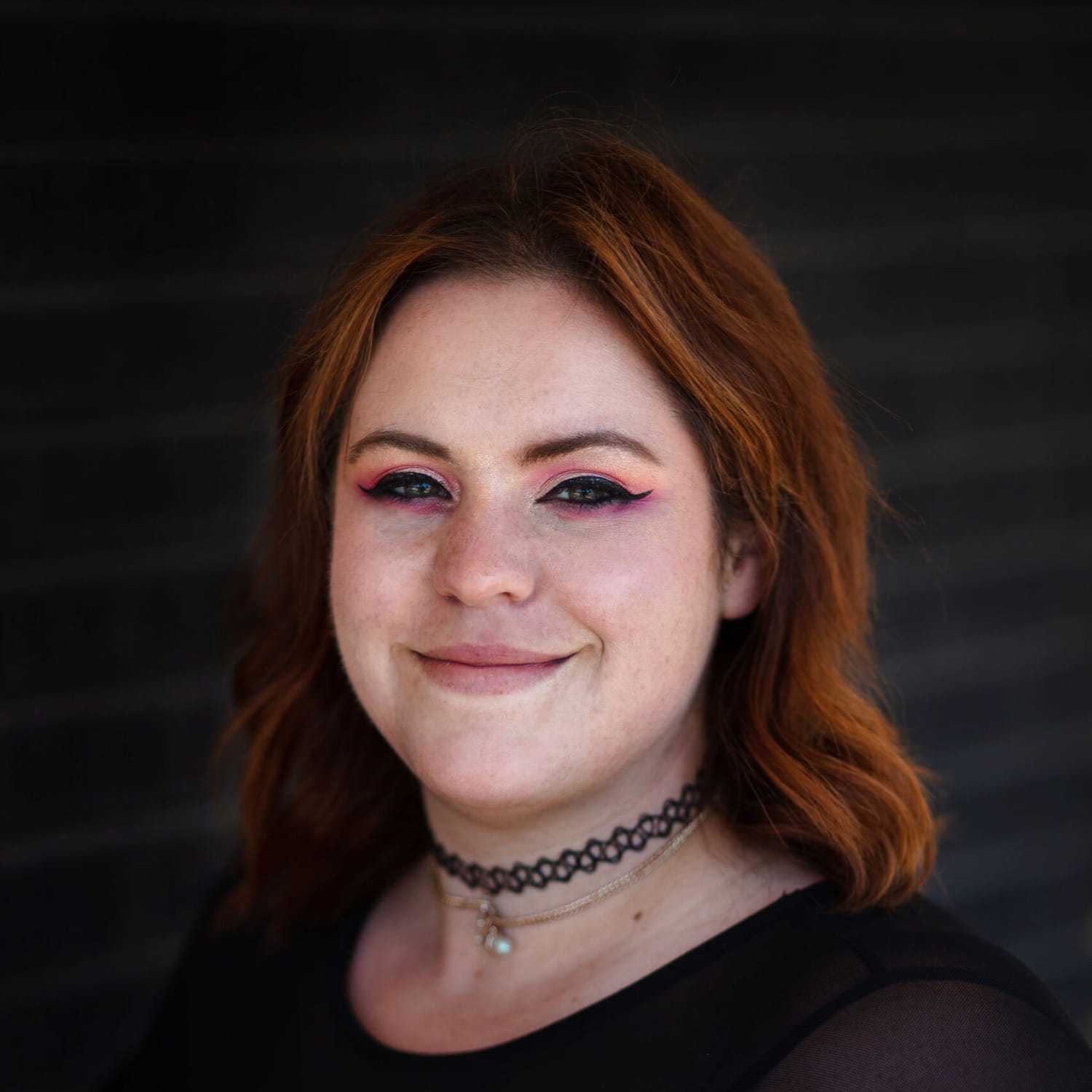 Portrait of Hannah B, a professional stylist at Style Bar Salon, showcasing their expertise and style.