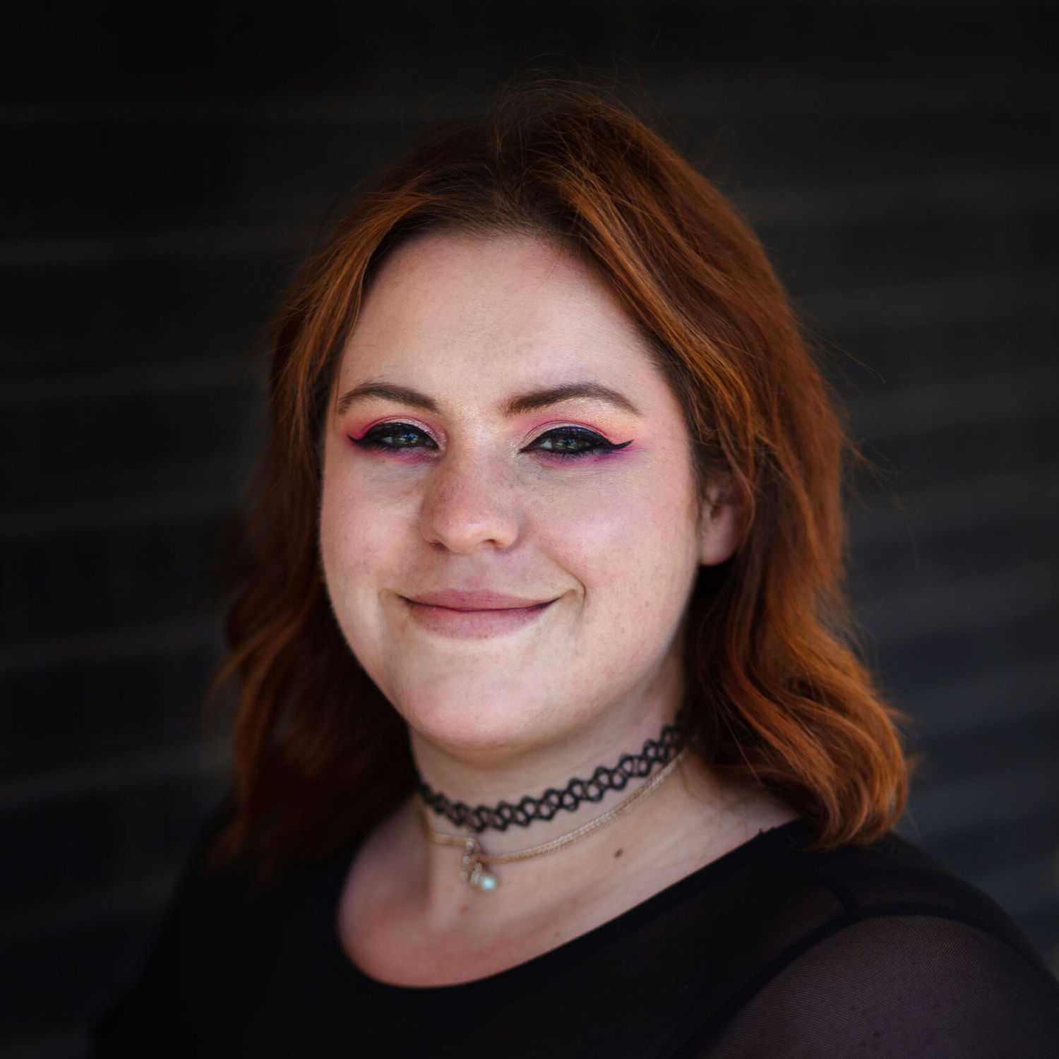 Portrait of Hannah B, a professional stylist at Style Bar Salon, showcasing their expertise and style.