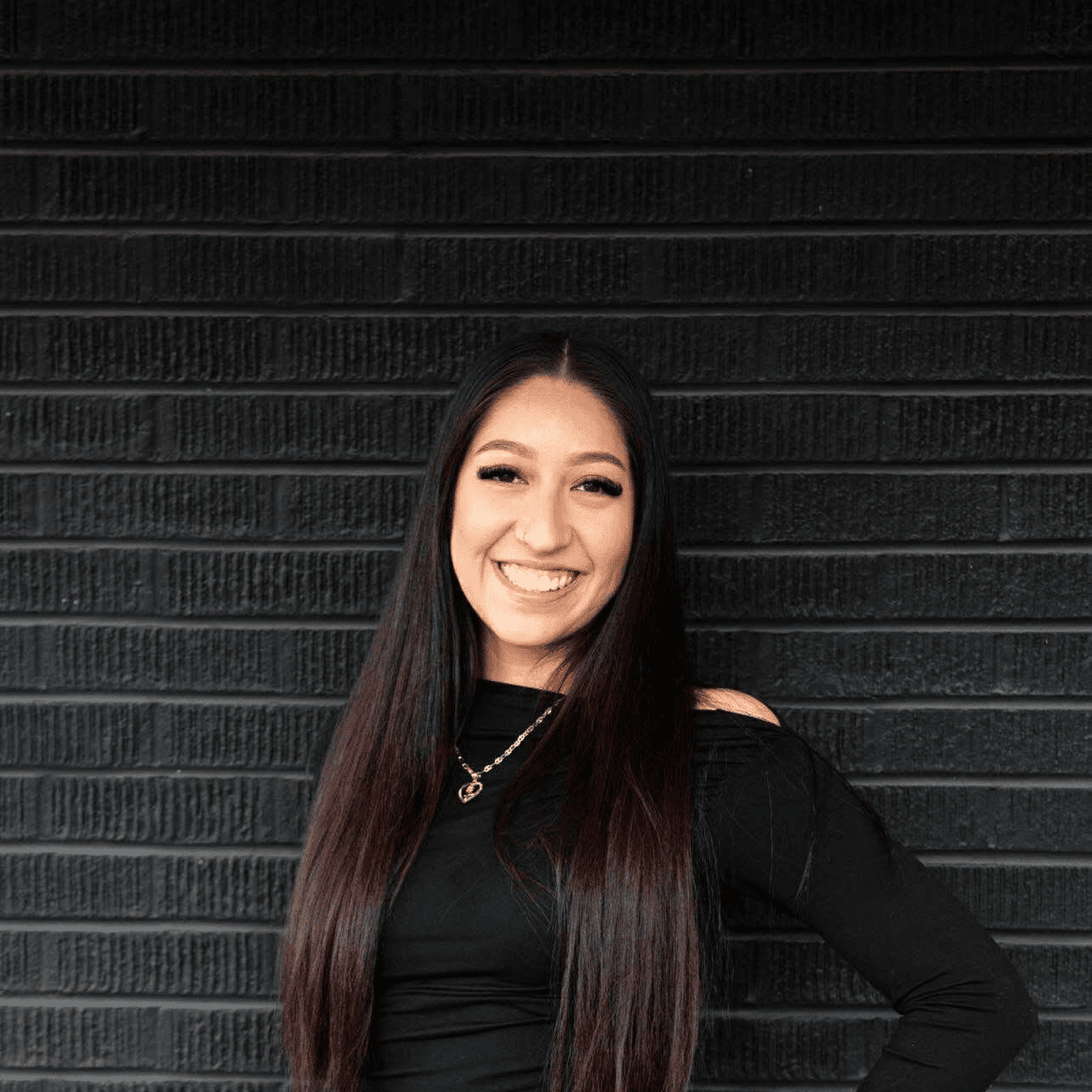 Portrait of Carla, a professional stylist at Style Bar Salon, showcasing their expertise and style.